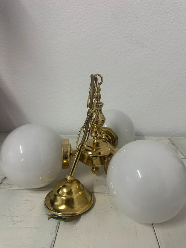 Vintage brass chandelier — globe detail
