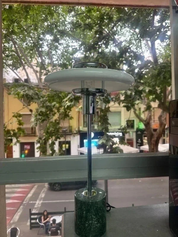 UFO lamp in window, bright white light
