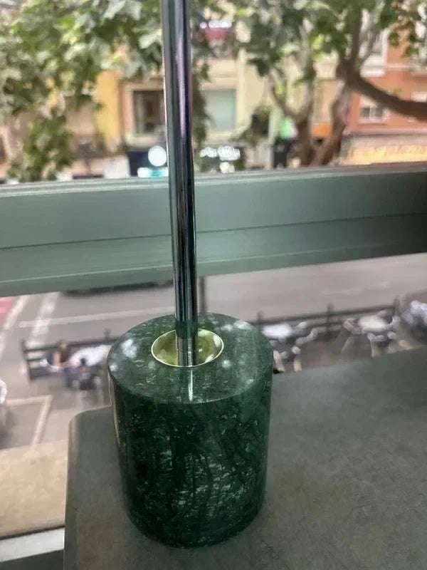 Chrome stem and marble base detail