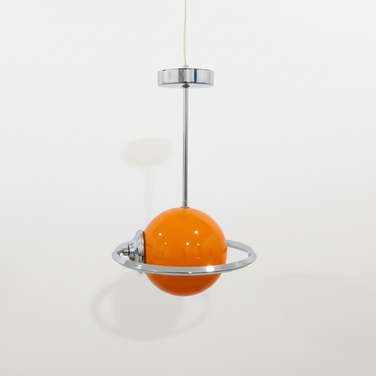 Hero shot of Space Age pendant lamp with orange glass sphere and chrome ring